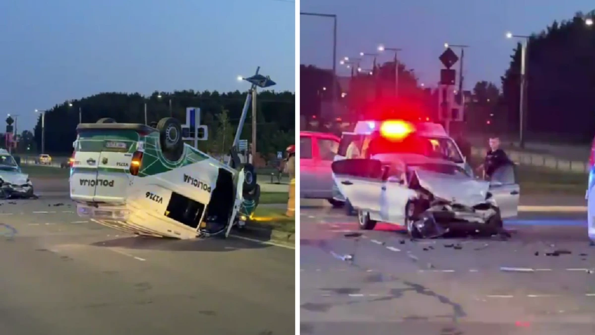 Viļņā pēc sadursmes ar BMW uz sāniem apgāzies policijas auto